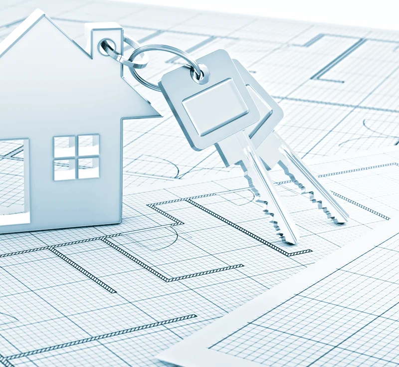 Abstract blueprint design with key on house key ring